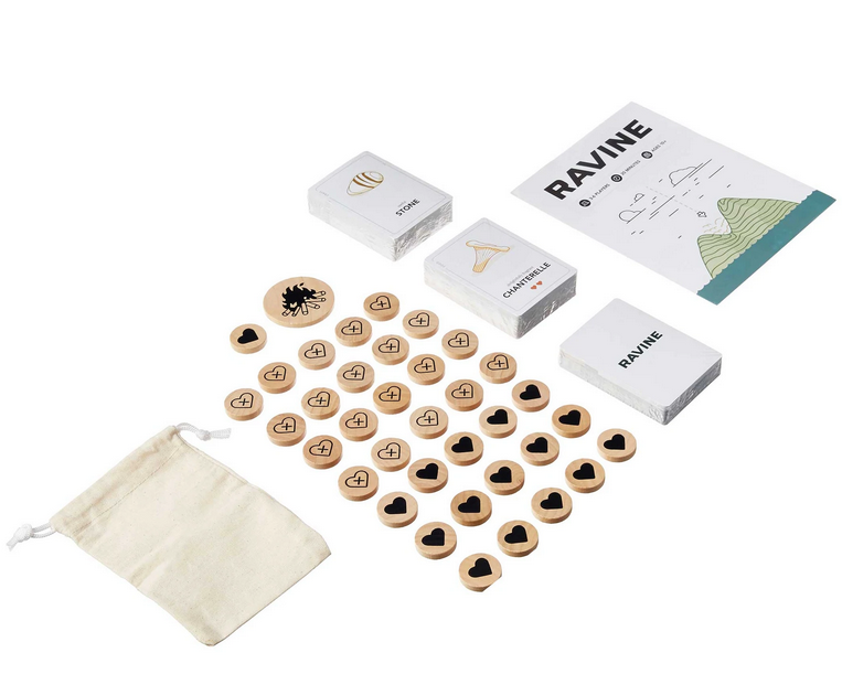 Ravine survival card game components including cards, wooden tokens, rulebook, and cloth pouch for 3-6 players ages 10+