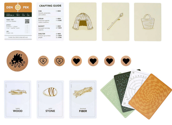 Ravine survival card game components including crafting guide, resource cards, and wooden tokens for cooperative play.