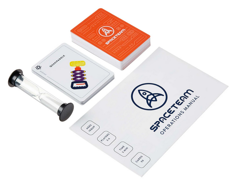 Spaceteam card game components including cards, hourglass timer, and operations manual for cooperative play.