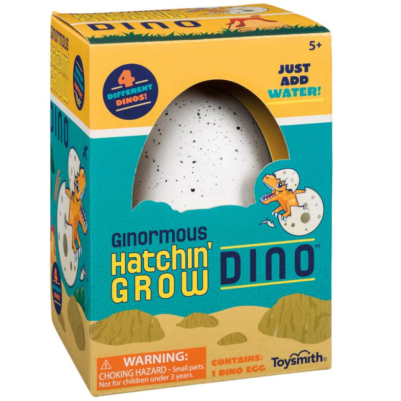 Ginormous Hatchin' Grow Dino dinosaur egg toy in packaging with water hatch instructions and four dino options visible.