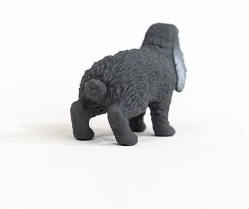 Lop Eared Rabbit figurine from Schleich Farm World showing the floppy-eared bunny facing away on a white background.