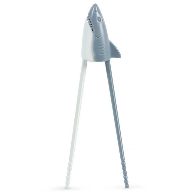 Munchtime Chopsticks Shark with hinged design that opens the shark's mouth for fun, easy-to-use eating experience.