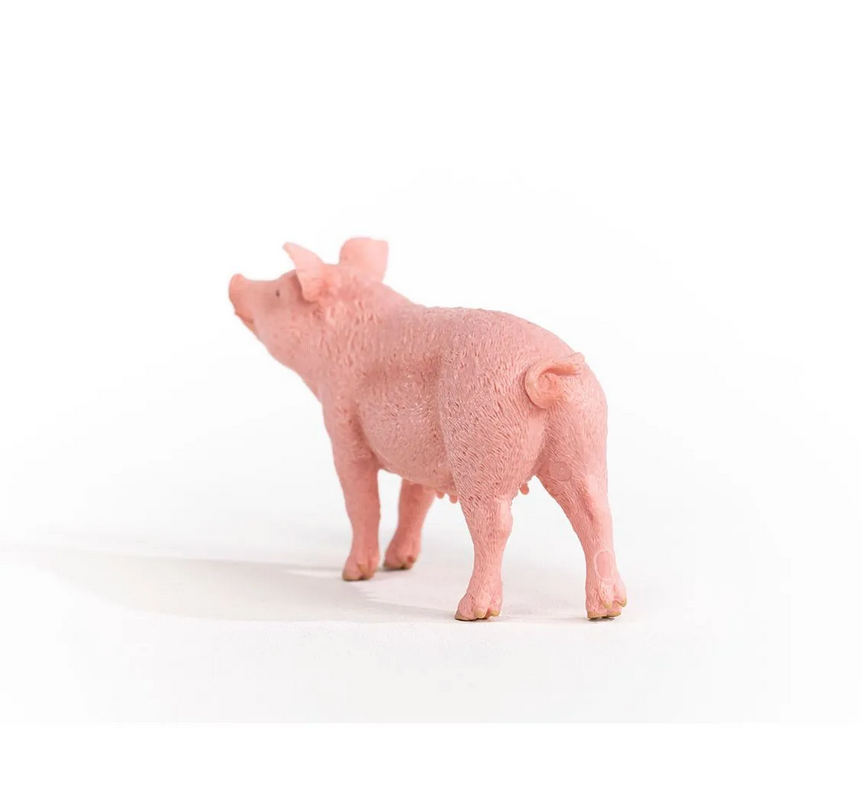 Pig toy figurine from Schleich Farm World showing realistic pink bristled skin and curled tail, perfect for imaginative play.