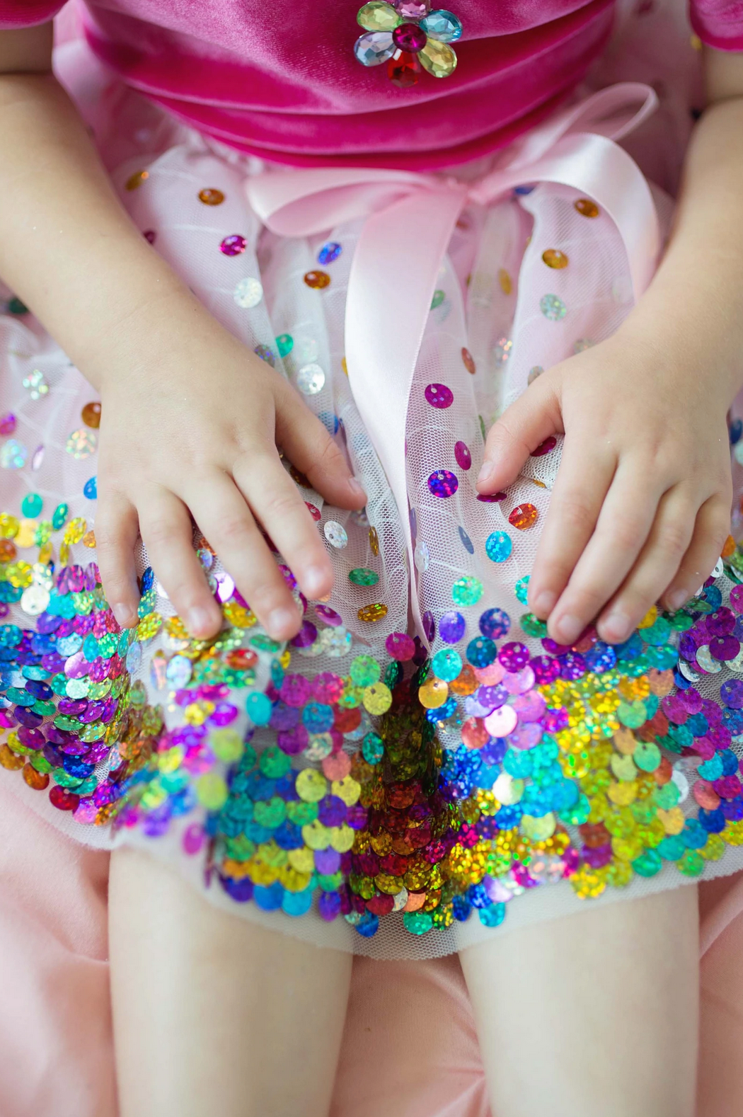 Sequins Skirt | Party Fun Size Multi featuring a soft pink base with colorful rainbow sequins and a satin bow.
