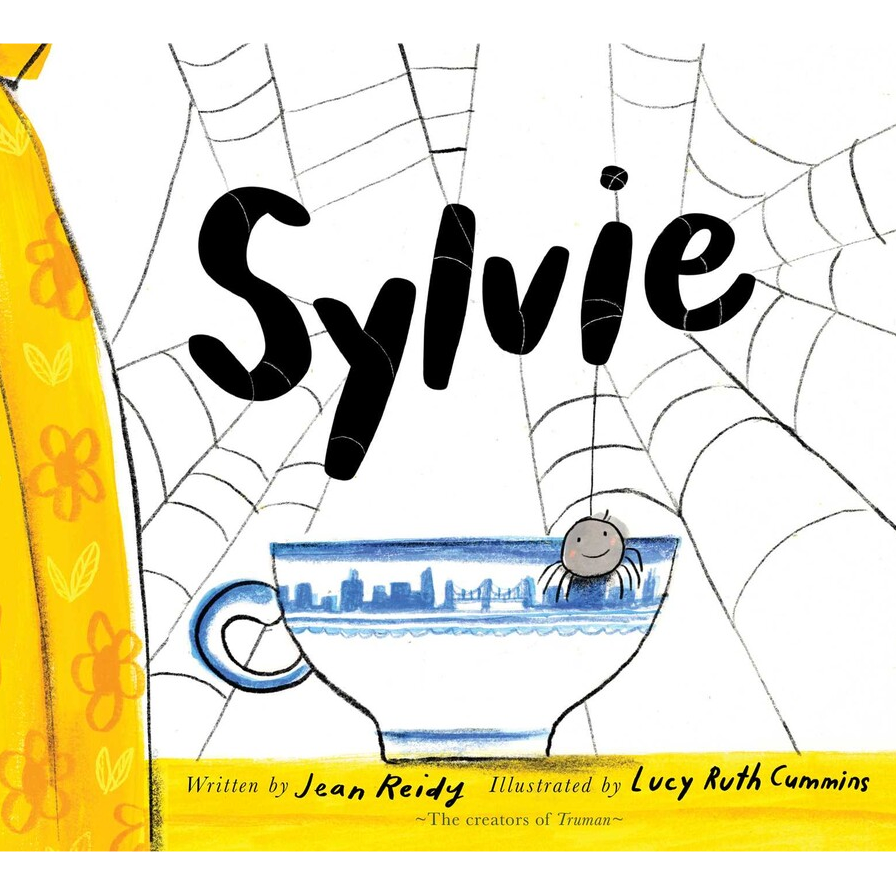 Sylvie book cover with a small smiling spider on a blue patterned teacup under web strands.