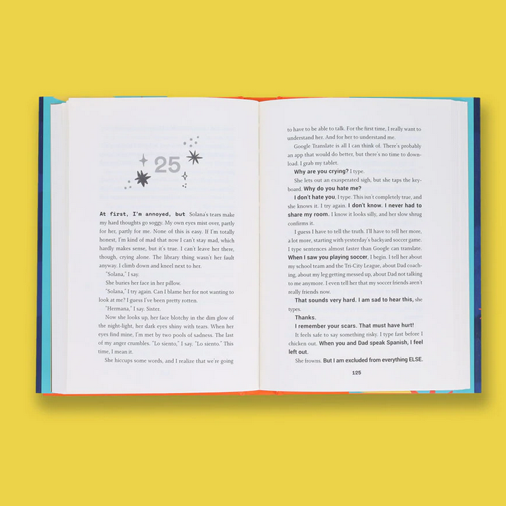 Open book showing pages from Shine On, Luz Veliz!, a coming-of-age story blending family and self-discovery themes.