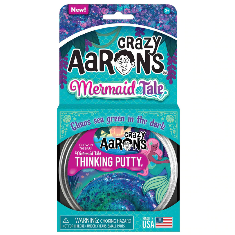 Glowbrights Mermaid Tail Thinking Putty in purple and turquoise shimmer glows sea green in the dark in a tin packaging.