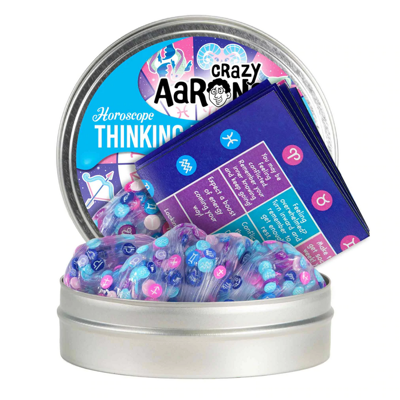 Trendsetters Horoscope Thinking Putty in a tin with colorful zodiac symbols and an astrology guide card included.