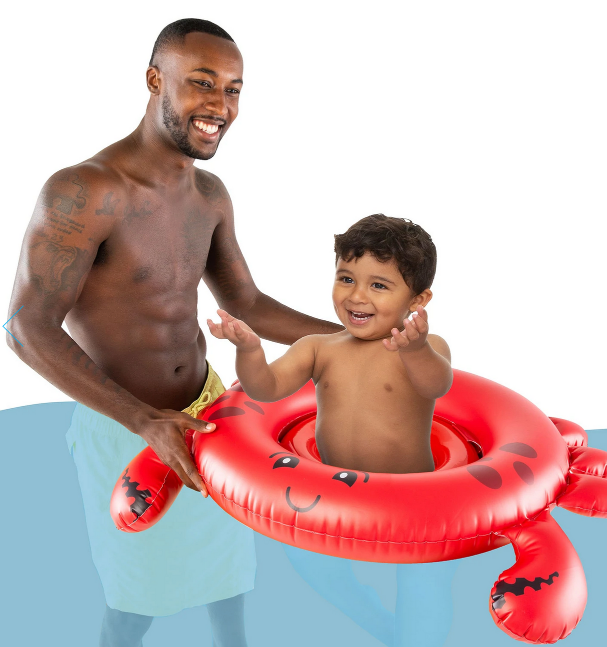 Lil Float | Crab with a happy toddler sitting inside a red crab-shaped float held by a smiling man.