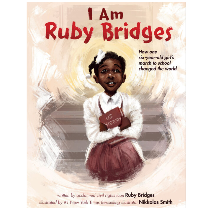 Cover of I Am Ruby Bridges showing a young girl holding a US History book with a hopeful expression
