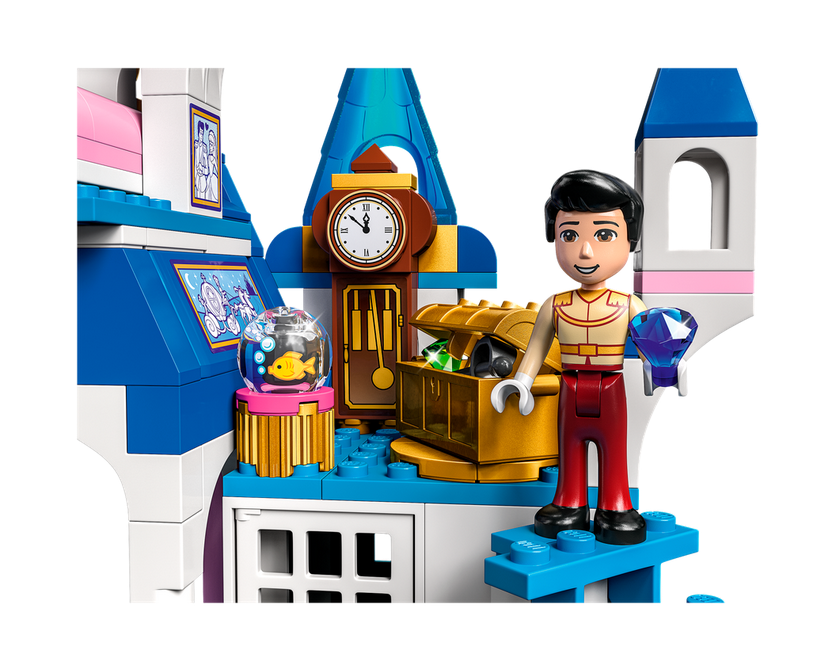 LEGO Disney Princess Cinderella & Prince Charming's Castle with Prince Charming mini-figure holding a gem by a treasure chest.