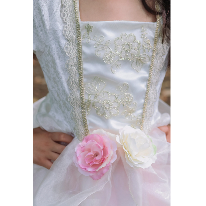 Close-up of Golden Rose Princess Dress featuring gold embroidery and pink and white roses on the elasticized waistband.