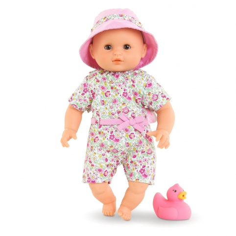 Bath Baby Coralie doll in floral swimsuit and pink hat with pink rubber duck bath toy for water play.