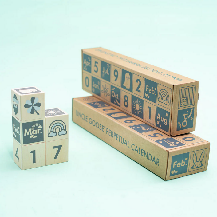 Perpetular Calendar Blocks wooden cubes show months, dates, weather, and holiday icons for educational fun.