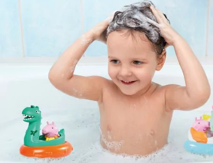 Peppa Pig Float Dino with George and dinosaur water squirter floating in bath, perfect for imaginative water play.