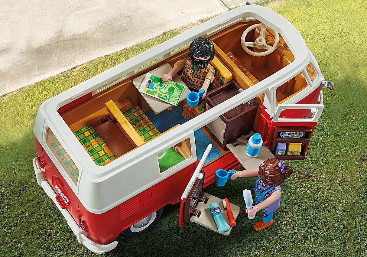 Volkswagen T1 Camp Bus with removable roof, detailed interior, side doors, folding table, and two PLAYMOBIL figures.
