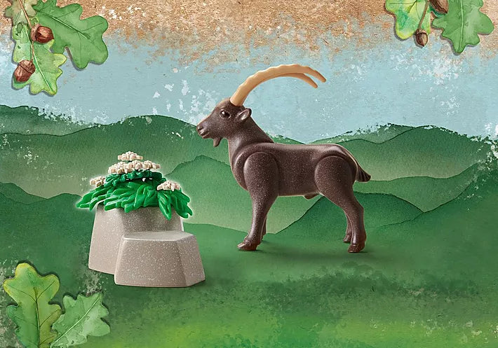 Wiltopia Capricorn toy ibex with mountain rocks and greenery background for imaginative play and learning.
