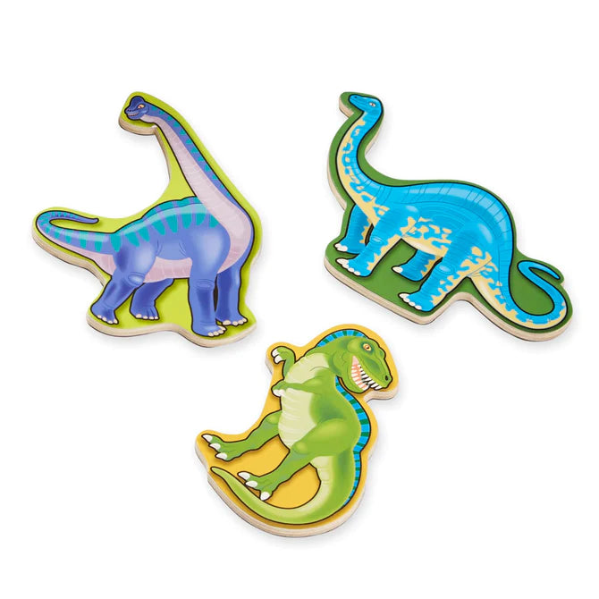 Dinosaur Magnets featuring three colorful wooden dinosaur magnets perfect for creative play and storytelling.