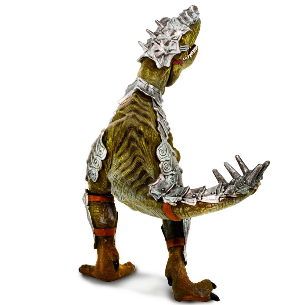Armored T-Rex toy with detailed silver armor pieces on head, legs, chest, and tail, featuring a movable jaw.