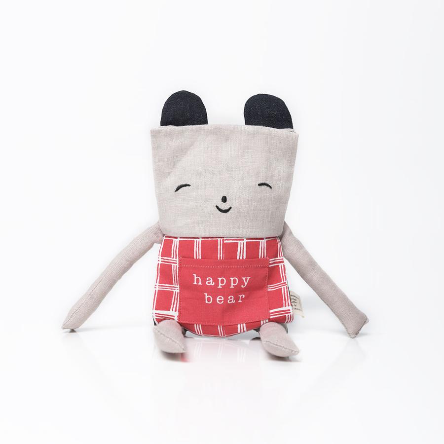Organic Flippy Friend | Bear soft cuddly toy with happy face and red apron made from 100% organic cotton.