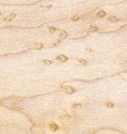 Bird's-Eye Maple Travel Cribbage Board showing pale hardwood with swirling bird’s-eye patterns and peg holes.