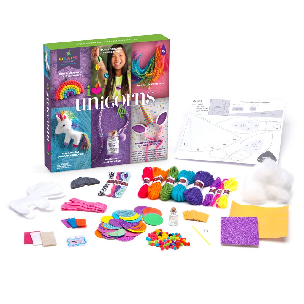 i <3 unicorns kit with colorful crafting materials including yarn, felt, pom poms, and project templates for kids ages 7+