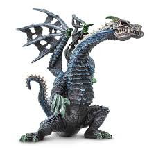 Ghost Dragon figure with black, grey, and blue scales, white skull, and green horns in a dynamic pose.