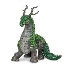 Jungle Dragon toy with leaf-like green scales, tree trunk legs, and branch-like horns, standing 5 inches tall.