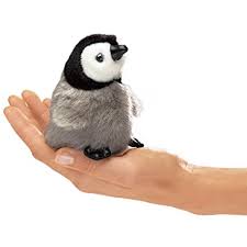 Emperor Penguin Finger Puppet held on a hand, fluffy and soft, perfect for kids' storytelling and pretend play.