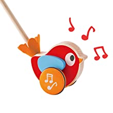Musical Bird Push Toy showing colorful wooden bird with detachable stick and musical notes around it.