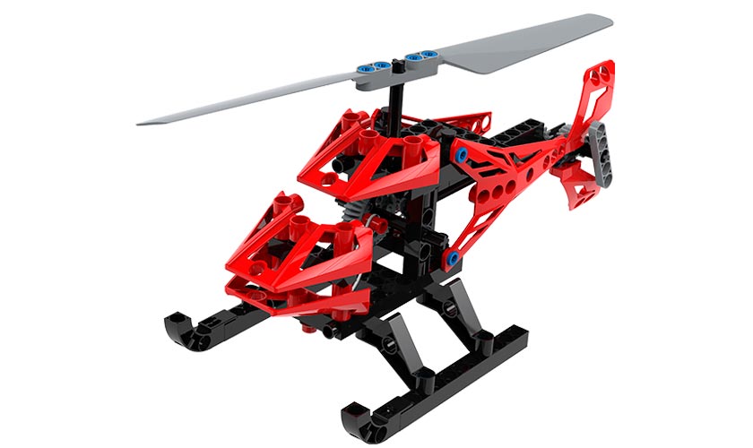 Geared Up Gadgets red and black helicopter model with spinning rotor built from interlocking plastic parts.
