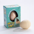 Hatch Em Penguin toy with plastic egg that cracks open in water revealing a growing penguin figure for ages 6+