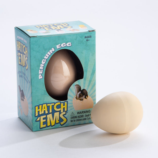 Hatch Em Penguin toy with plastic egg that cracks open in water revealing a growing penguin figure for ages 6+