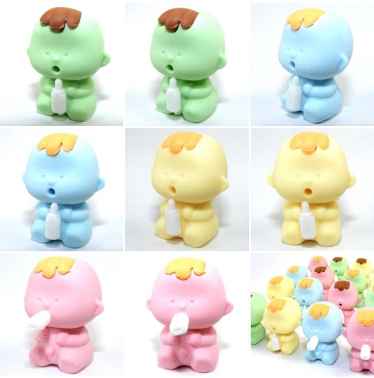 Japanese Eraser Baby puzzle eraser toys in assorted pastel colors holding a bottle, handcrafted and eco-friendly.