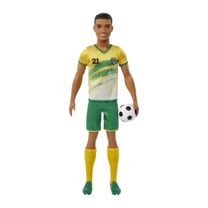 Barbie Ken Soccer #21 doll wearing yellow and green uniform holding a soccer ball with number 21 on shirt.