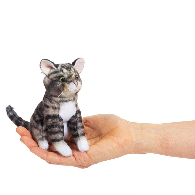 Hand holding a detailed Mini Tabby Cat Finger Puppet, showing its small, realistic design and cute features.