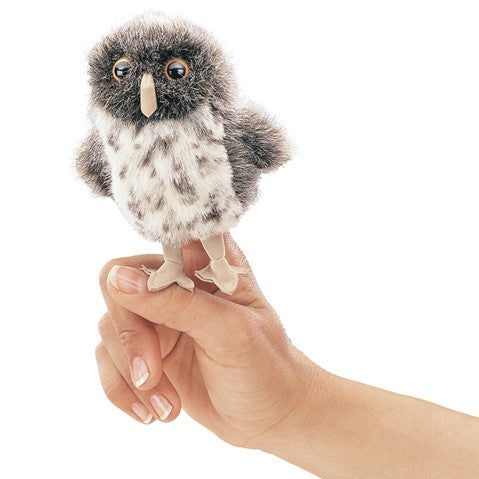 Spotted Owl Finger Puppet perched on a finger, featuring soft feathers and realistic owl details for interactive play.