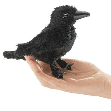 Raven Finger Puppet showing a black plush raven held in hand, perfect for storytelling and imaginative play.