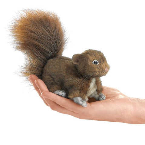 Red Squirrel Finger Puppet shown resting on a hand, featuring soft fur and lifelike design for children ages 3 and up.