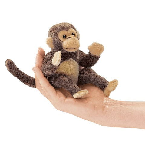 Monkey Finger Puppet shown in hand, soft and velvety with long tail, perfect for jungle-themed stories and play.