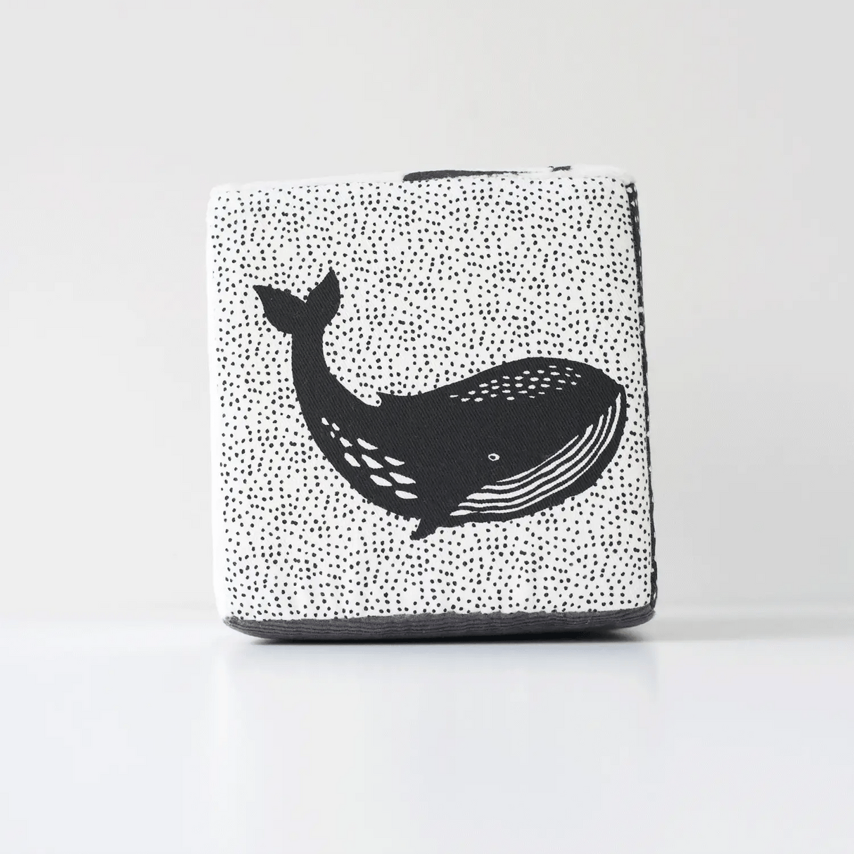 Organic Soft Block | Ocean featuring a high-contrast whale design on soft organic cotton fabric block.