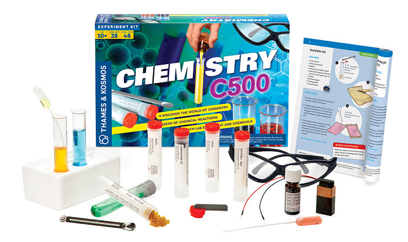 Chemistry 500 experiment kit with test tubes, safety glasses, chemicals, and instruction manual for kids aged 10 and up.