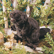 Beaver Puppet with sleek brown fur, textured flat tail, movable mouth, and realistic paws in a natural forest setting.