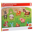 9pc Farm Animals Peg Puzzle with brightly colored wooden animal pieces including donkey, cow, horse, pig, and more for toddlers.