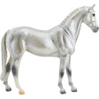 Grey Trakehner model horse with pearl grey coat, detailed mane, and lifelike pose from the Freedom Series collection.
