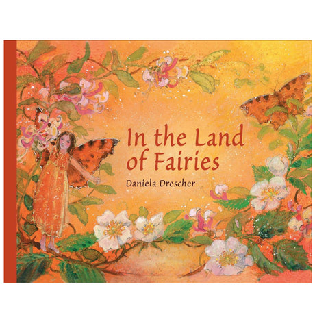 Cover of "In the Land of Fairies" with a fairy, flowers, and butterflies in warm autumn colors.