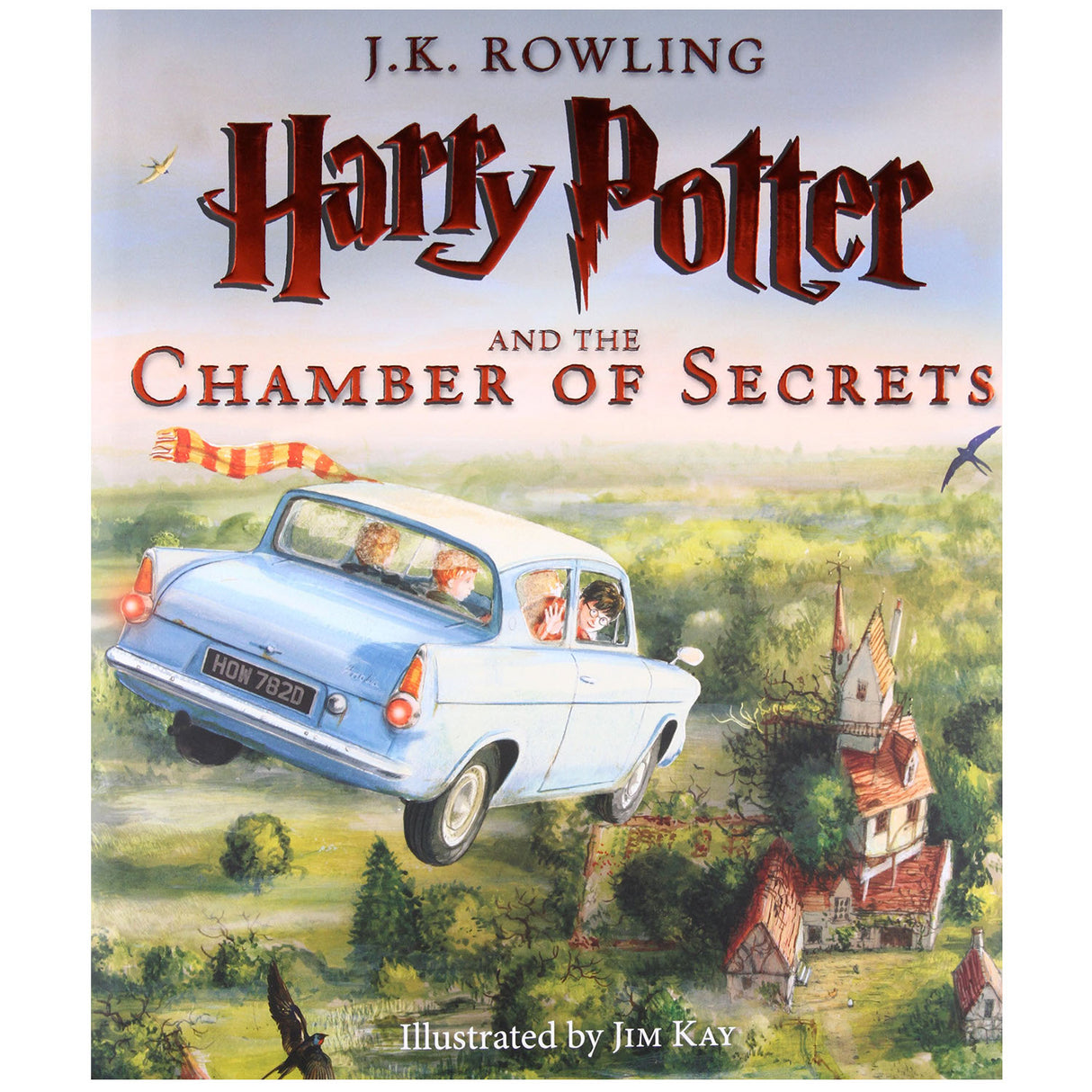 Cover of Harry Potter and the Chamber of Secrets Illustrated Edition showing flying car above countryside near Hogwarts.