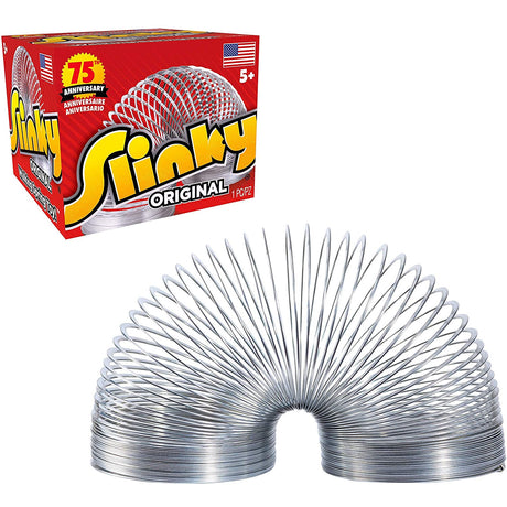 Slinky Original metal spring toy bending in a curve next to its red 75th anniversary packaging box.