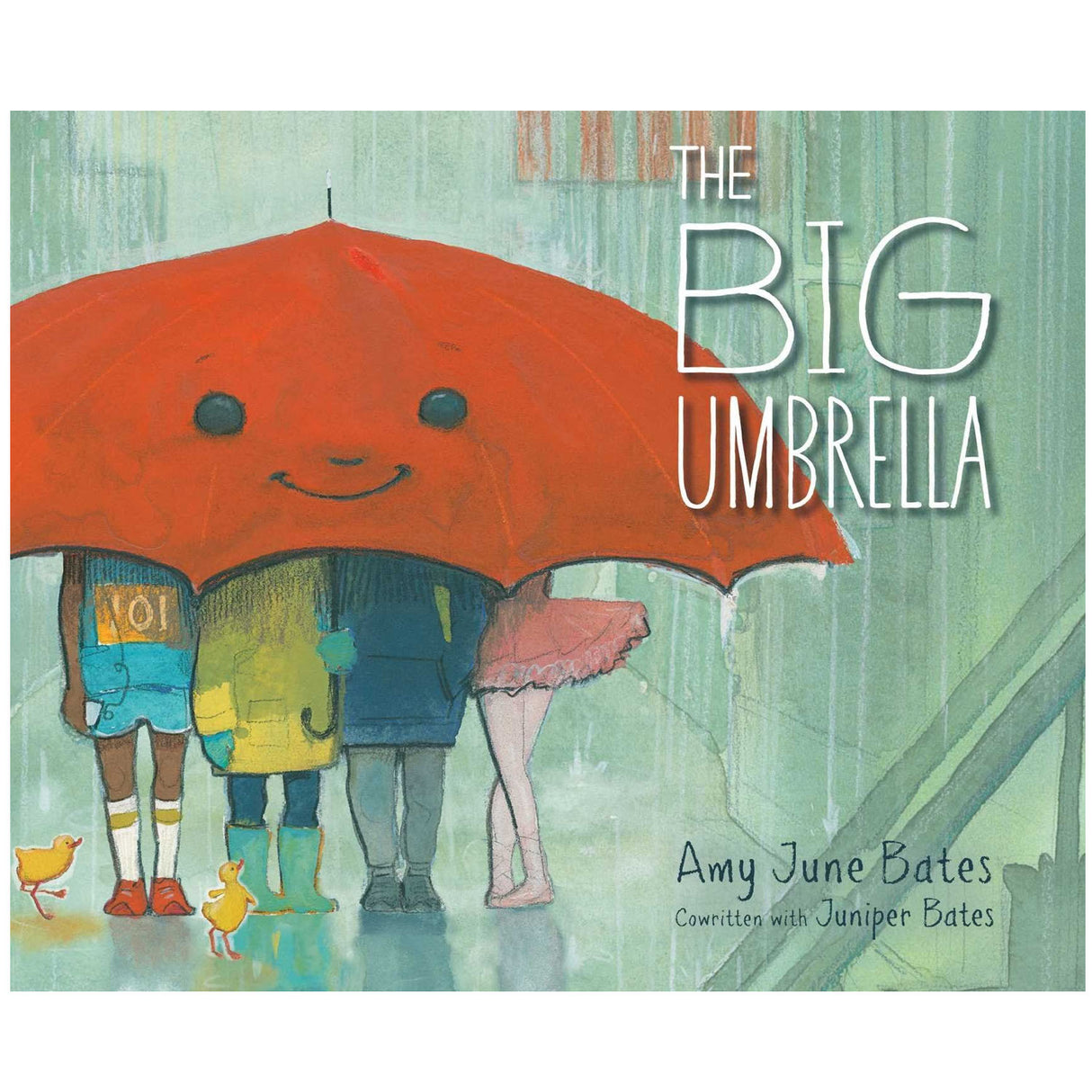 Cover of The Big Umbrella book showing diverse children smiling under a large red umbrella on a rainy day.