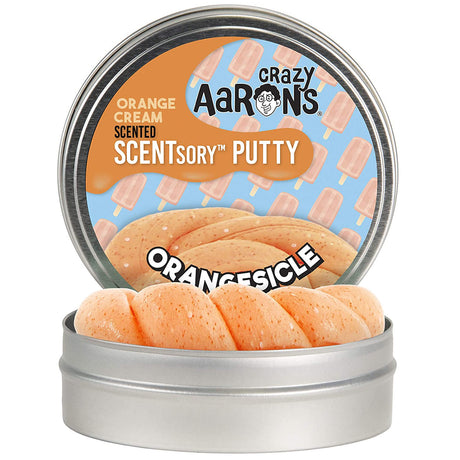 SCENTsory Orangesicle Thinking Putty in an open tin, light orange with white and orange speckles, scented orange cream putty.